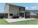 Backyard with outdoor patio, grill and screened in porch at 5094 Thornton Dr, Summerville, SC 29485