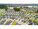 Aerial view of a neighborhood with homes and a scenic lake at 512 Alderly Dr, Moncks Corner, SC 29461