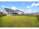 Expansive backyard with a pristine lawn, offering plenty of space for outdoor activities at 512 Alderly Dr, Moncks Corner, SC 29461