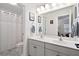 Bright bathroom featuring a double sink vanity, a large mirror, and a shower-tub combination at 512 Alderly Dr, Moncks Corner, SC 29461