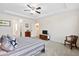 Cozy main bedroom featuring a ceiling fan, neutral walls, and carpet flooring at 512 Alderly Dr, Moncks Corner, SC 29461