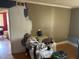 Photo of a room with partially painted wall, chair, and discarded items at 516 Arlington Dr # B5, Charleston, SC 29414