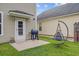 Backyard featuring a grill and unique hanging chair, perfect for relaxing and entertaining at 520 Crossland Dr, Moncks Corner, SC 29461
