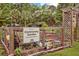 Well-maintained community garden featuring raised beds, signage, and thriving vegetation at 520 Crossland Dr, Moncks Corner, SC 29461