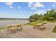 Community pier with picnic tables overlooking a tranquil lake, perfect for outdoor gatherings and scenic views at 520 Crossland Dr, Moncks Corner, SC 29461
