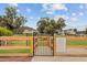 Dog park entrance with regulations posted, providing a secure and well-maintained space for furry friends at 520 Crossland Dr, Moncks Corner, SC 29461