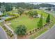 Aerial view of a fenced dog park, offering a safe and spacious area for pets to play and socialize at 520 Crossland Dr, Moncks Corner, SC 29461