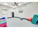 Well-equipped fitness room with stability balls, step platforms, and a wall-mounted television at 520 Crossland Dr, Moncks Corner, SC 29461