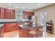 Modern kitchen boasting granite countertops, stainless steel appliances, and rich wood cabinetry at 520 Crossland Dr, Moncks Corner, SC 29461