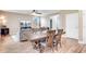 Open concept living area with dining table near the front door and view to living room at 520 Crossland Dr, Moncks Corner, SC 29461