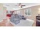 Open-concept living area seamlessly connecting the living room, dining area, and kitchen at 520 Crossland Dr, Moncks Corner, SC 29461