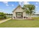 View of open air pavilion with picnic tables, barbeque grills, and lake views at 520 Crossland Dr, Moncks Corner, SC 29461