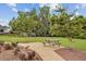 Picnic table on a concrete pad in a community green space near the playground at 520 Crossland Dr, Moncks Corner, SC 29461