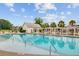 Sparkling community pool with pergola and clubhouse offering a relaxing oasis for residents at 520 Crossland Dr, Moncks Corner, SC 29461