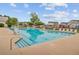 Well-maintained community pool with lounge chairs and a playground in the background at 520 Crossland Dr, Moncks Corner, SC 29461