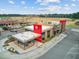 Aerial view of a Wendy's restaurant featuring a clean exterior, outdoor seating, and drive-thru at 520 Crossland Dr, Moncks Corner, SC 29461