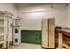 Basement features a water heater, workbench, shelving, and storage at 5322 Chantilly Ln, North Charleston, SC 29418