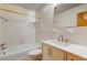 Bathroom with white tile, tub, toilet, and vanity with sink at 5322 Chantilly Ln, North Charleston, SC 29418