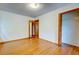 This bedroom has wood floors, white walls, and a closet with paneled doors at 5322 Chantilly Ln, North Charleston, SC 29418