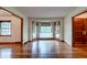 Spacious living room with bay windows and hardwood floors at 5322 Chantilly Ln, North Charleston, SC 29418
