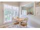 Cozy breakfast nook with large windows, comfortable seating, and natural light at 5347 Sundial Ct, North Charleston, SC 29418