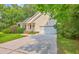 Charming single-story home with attached garage, covered porch, and well-maintained landscaping at 5347 Sundial Ct, North Charleston, SC 29418