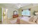 Spacious main bedroom suite with tray ceilings, warm decor, and lots of natural light at 5347 Sundial Ct, North Charleston, SC 29418