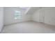 Spacious room with neutral carpet and paint, ample natural light, and a closet at 5347 Sundial Ct, North Charleston, SC 29418