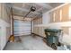 Spacious garage with large roll-up door at 546 Tayrn Dr, Charleston, SC 29492