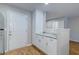 Kitchen area with white cabinets, granite countertops, and breakfast bar at 546 Tayrn Dr, Charleston, SC 29492