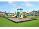 Community playground with slides and climbing structure, perfect for Gathering fun and outdoor activities at 602 Quiet Valley Rd, Summerville, SC 29486
