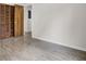 Bedroom with wood-look floors and closet storage at 6241 Rolling Fork Rd # C, North Charleston, SC 29406