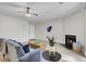 Inviting living room with wood-look floors, fireplace, and modern furnishings at 6241 Rolling Fork Rd # C, North Charleston, SC 29406