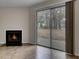 Comfortable living room with fireplace and sliding doors with outdoor view at 6241 Rolling Fork Rd # C, North Charleston, SC 29406