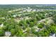 A lush, green neighborhood with tree-lined streets and well-maintained homes creating a serene residential atmosphere at 886 Friendly Cir, Charleston, SC 29414