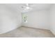 Bright, neutral bedroom with carpeting and a sun-filled window with outdoor views at 886 Friendly Cir, Charleston, SC 29414