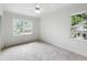 Carpeted bedroom with large windows and natural light at 886 Friendly Cir, Charleston, SC 29414