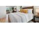 Comfortable bedroom with large windows and a view into the bonus room, perfect for relaxing and sleeping at 886 Friendly Cir, Charleston, SC 29414