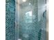 Close up of glass enclosed shower with custom tile work at 886 Friendly Cir, Charleston, SC 29414