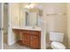 The bathroom includes a toilet, vanity and mirror at 8967 N Red Maple Cir, Summerville, SC 29485