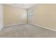 This is a bedroom with neutral walls, carpet and a window at 8967 N Red Maple Cir, Summerville, SC 29485