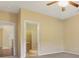 The main bedroom features neutral walls, carpet, ceiling fan and ensuite bathroom with a walk-in closet at 8967 N Red Maple Cir, Summerville, SC 29485