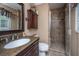 Bathroom features a granite vanity, updated fixtures, and tiled walk-in shower at 930 Stiles Dr, Charleston, SC 29412
