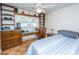 Bedroom with built-in desk, shelves, and storage that provides functional space at 930 Stiles Dr, Charleston, SC 29412