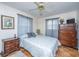 Comfortable bedroom showcasing a queen bed, hardwood floors, and ample natural light at 930 Stiles Dr, Charleston, SC 29412