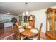Cozy dining area featuring a wooden table, traditional decor, and access to the kitchen at 930 Stiles Dr, Charleston, SC 29412