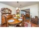 Charming dining room with a wood table, decorative furniture, and natural light at 930 Stiles Dr, Charleston, SC 29412