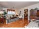 Cozy living room with hardwood floors and classic furnishings, illuminated by natural light at 930 Stiles Dr, Charleston, SC 29412