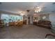 Large, inviting living space offering ample room for dining and relaxation with natural lighting at 930 Stiles Dr, Charleston, SC 29412