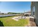 Backyard featuring seating area and a beautiful pond view at 9711 Fanning Basket Ln, Ladson, SC 29456